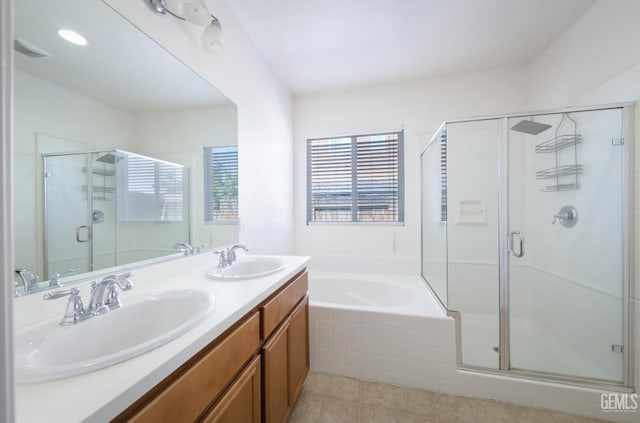 5812 Turquoise Ridge Dr, Bakersfield, CA 93313 - full bath featuring a shower stall, a garden tub, double vanity, and tile patterned floors