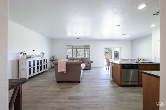 5812 Turquoise Ridge Dr, Bakersfield, CA 93313 - living area with light wood-style floors and recessed lighting