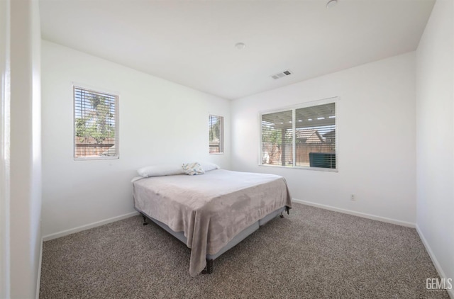 5812 Turquoise Ridge Dr, Bakersfield, CA 93313 - carpeted bedroom with baseboards