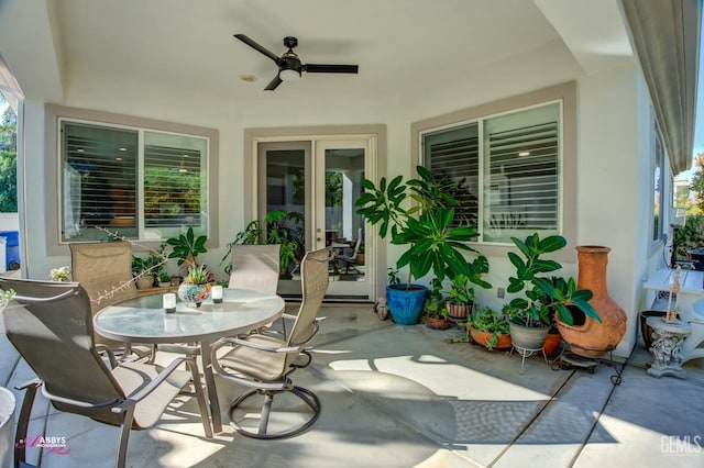 view of patio featuring ceiling fan