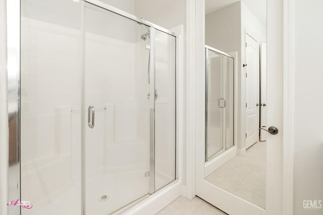 bathroom featuring tile patterned floors and walk in shower