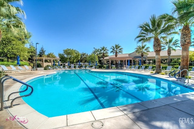 view of swimming pool featuring a patio area