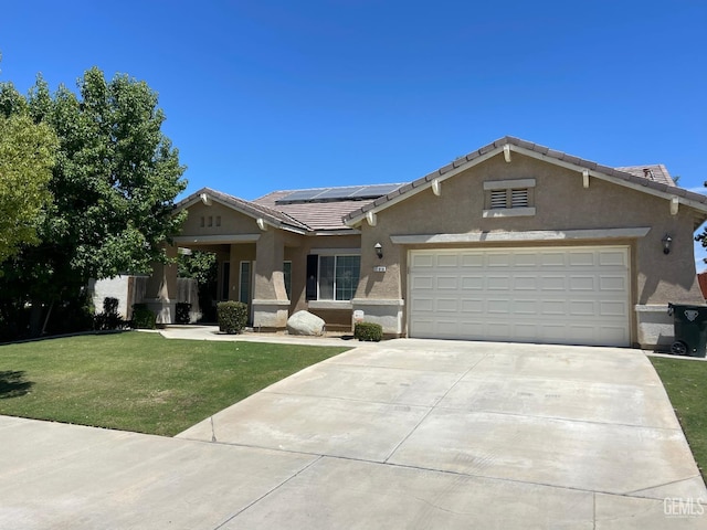 11016 Snowcreek Falls Ave, Bakersfield, CA 93312 - ranch-style home with stucco siding, a front lawn, solar panels, concrete driveway, and a garage