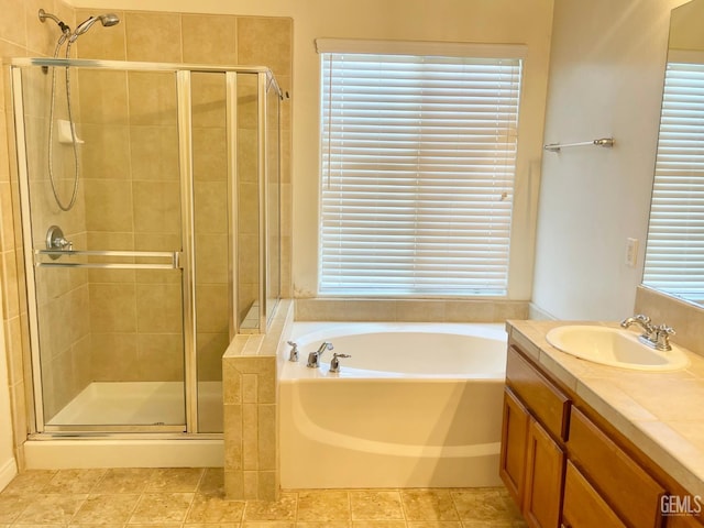 11016 Snowcreek Falls Ave, Bakersfield, CA 93312 - full bath featuring vanity, a shower stall, and a bath