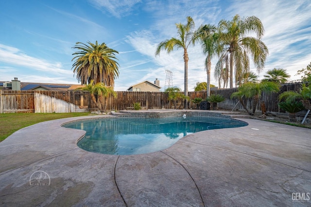 view of swimming pool with a patio