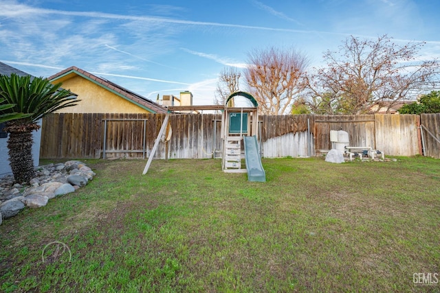 view of yard featuring a playground