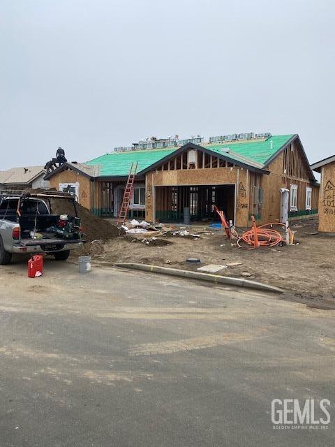 property in mid-construction featuring a garage