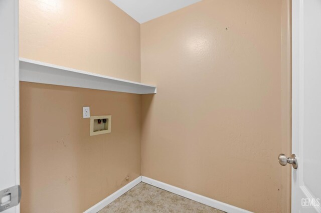 3406 Kimmie Rachelle Ct, Bakersfield, CA 93313 - laundry room featuring washer hookup and baseboards