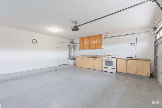 3406 Kimmie Rachelle Ct, Bakersfield, CA 93313 - garage featuring secured water heater, a sink, and a garage door opener
