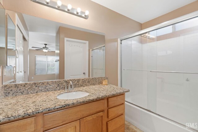3406 Kimmie Rachelle Ct, Bakersfield, CA 93313 - bathroom with vanity, combined bath / shower with glass door, and a ceiling fan