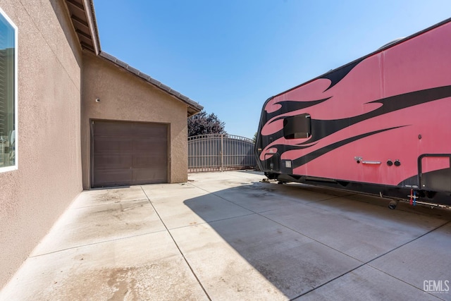 9803 Swansboro Way, Bakersfield, CA 93314 - garage with driveway and a gate