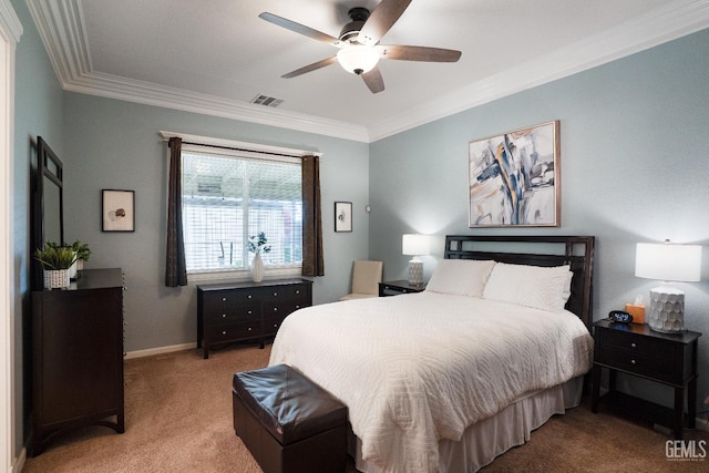 bedroom with visible vents, ornamental molding, baseboards, light colored carpet, and a ceiling fan