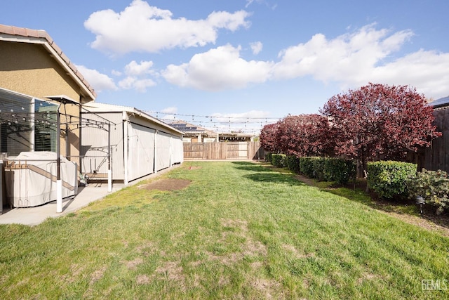 view of yard featuring a fenced backyard
