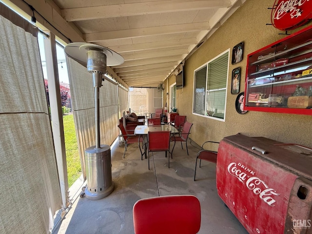 view of patio featuring outdoor dining area