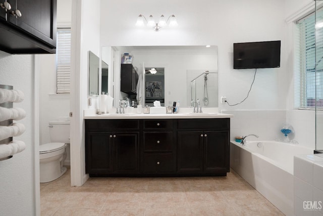 bathroom featuring double vanity, a bath, tile patterned flooring, a stall shower, and a sink