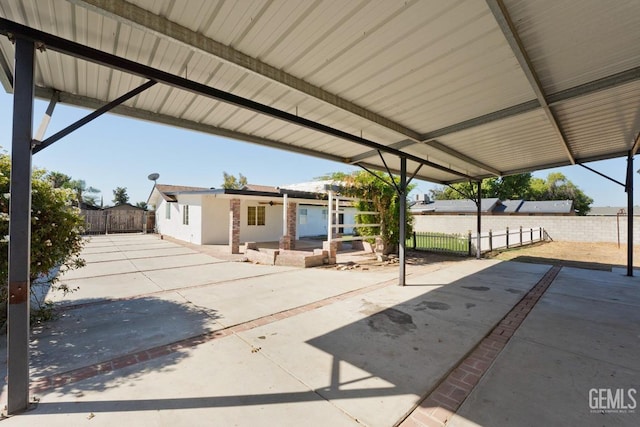 view of patio featuring ceiling fan