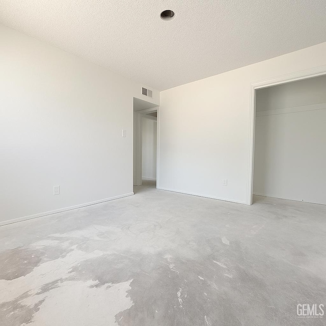 3804 University Ave, Bakersfield, CA 93306 - unfurnished bedroom featuring concrete flooring and a closet