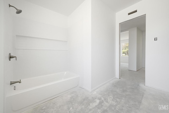 3804 University Ave, Bakersfield, CA 93306 - full bath featuring unfinished concrete flooring,  shower combination, and baseboards