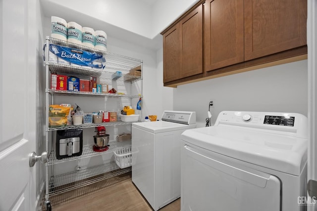 9003 Del Palma Dr, Bakersfield, CA 93314 - washroom with separate washer and dryer, cabinet space, and light wood-type flooring