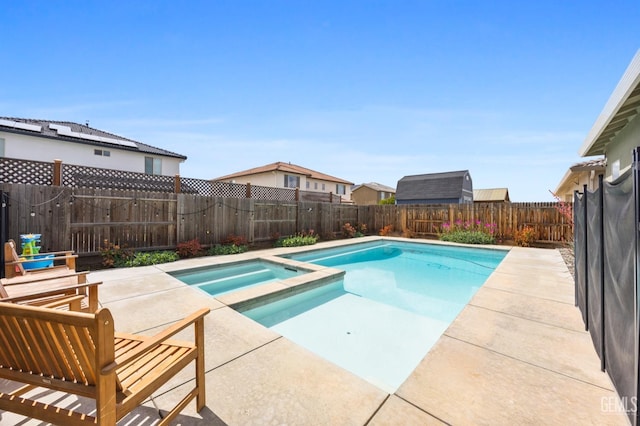 9003 Del Palma Dr, Bakersfield, CA 93314 - view of swimming pool with a patio area, a fenced backyard, and a pool with connected hot tub
