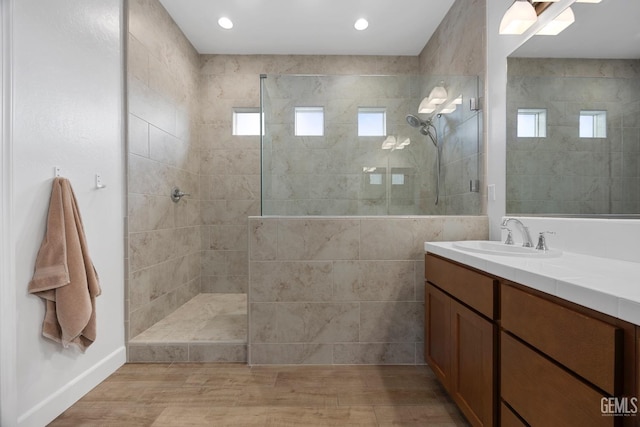 9003 Del Palma Dr, Bakersfield, CA 93314 - full bath featuring walk in shower, vanity, wood finished floors, and recessed lighting