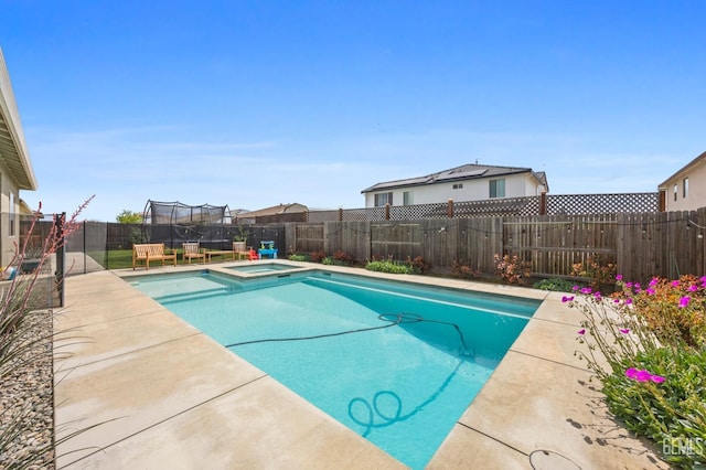 9003 Del Palma Dr, Bakersfield, CA 93314 - view of swimming pool featuring a fenced backyard, a pool with connected hot tub, and a patio area