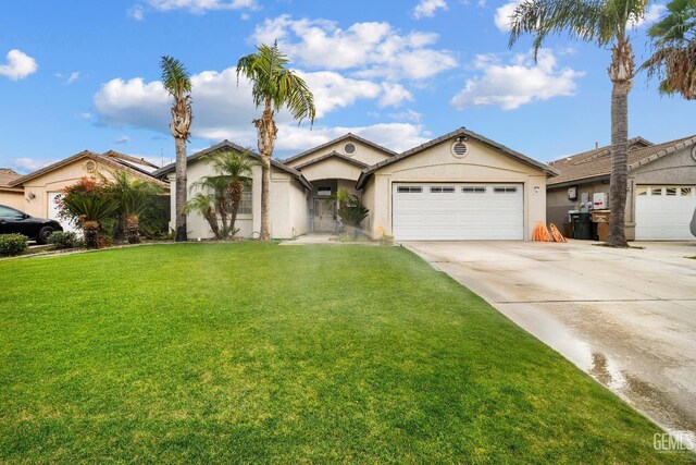 ranch-style house featuring a front yard and a garage