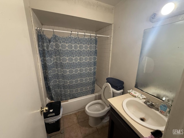 full bathroom featuring tile patterned floors, toilet, shower / tub combo, and vanity