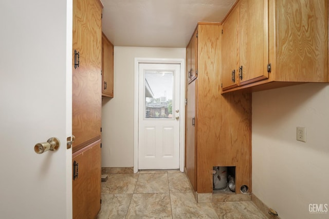 washroom with cabinet space