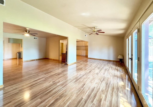1041 Golden Gate Ave, Dos Palos, CA 93620 - unfurnished living room featuring a ceiling fan and light wood-style floors
