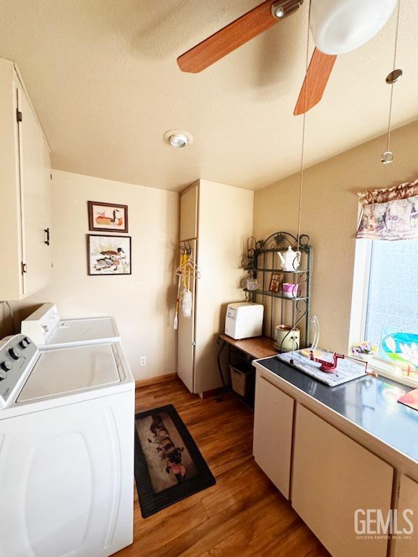 1041 Golden Gate Ave, Dos Palos, CA 93620 - laundry area featuring separate washer and dryer, a ceiling fan, and wood finished floors