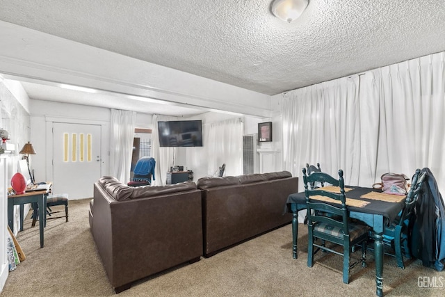 2122 Palm St, Bakersfield, CA 93304 - living room featuring carpet flooring and a textured ceiling
