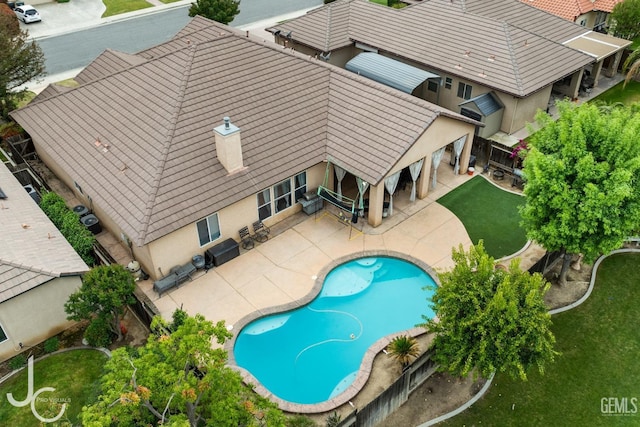 view of pool with a patio area and a fenced in pool