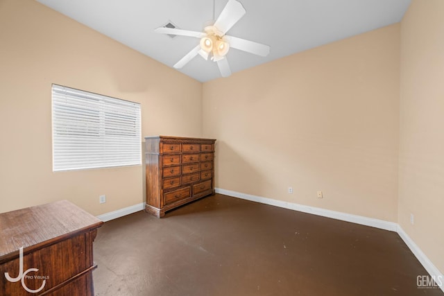 bedroom with ceiling fan, baseboards, and finished concrete floors