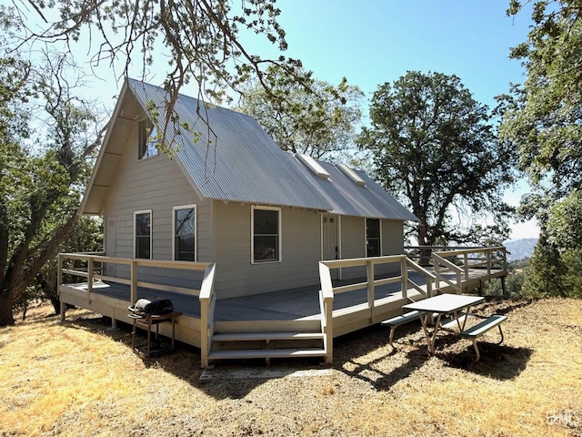 0 Rancheria Rd, Bakersfield, CA 93306 - view of home's exterior with a wooden deck and a metal roof