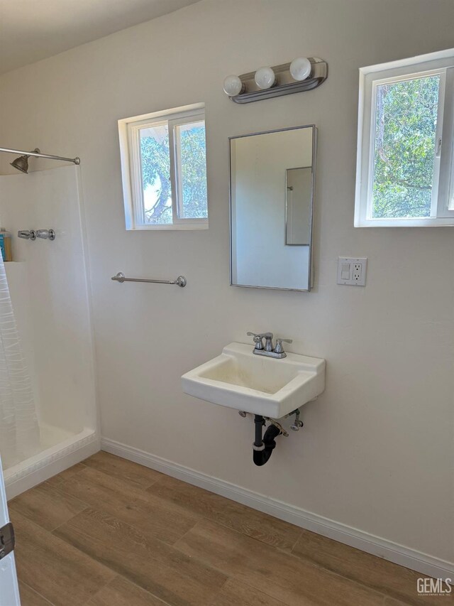 0 Rancheria Rd, Bakersfield, CA 93306 - bathroom featuring wood finished floors and a shower