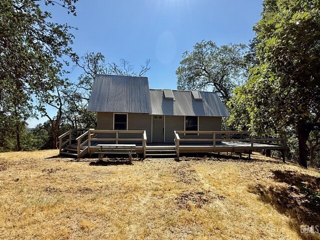 0 Rancheria Rd, Bakersfield, CA 93306 - back of property featuring a metal roof and a deck