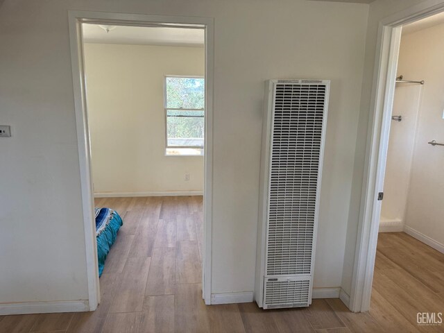 0 Rancheria Rd, Bakersfield, CA 93306 - hall featuring a heating unit and wood finished floors