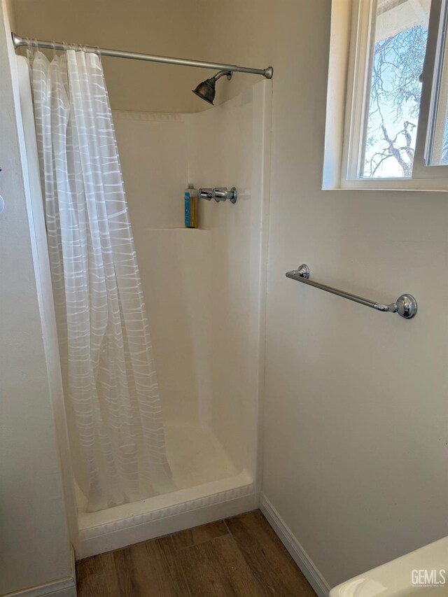 0 Rancheria Rd, Bakersfield, CA 93306 - full bath with wood finished floors and curtained shower