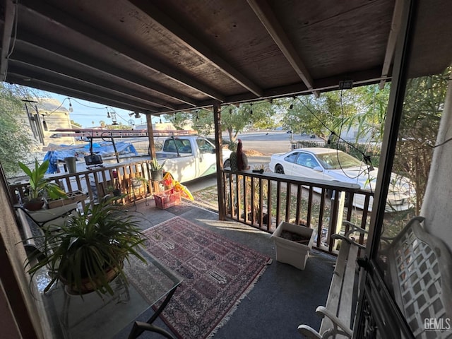 wooden deck featuring covered porch