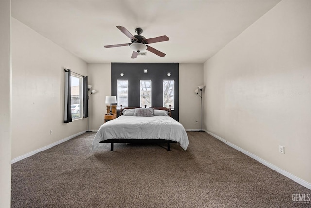 bedroom featuring carpet flooring, ceiling fan, and baseboards