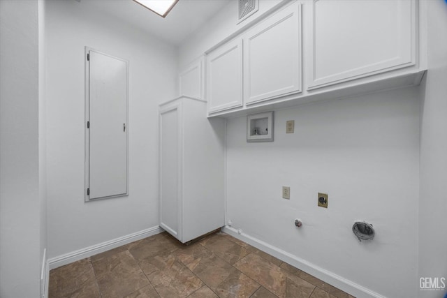 laundry area featuring washer hookup, visible vents, baseboards, cabinet space, and electric dryer hookup