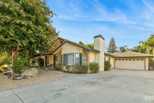 ranch-style house featuring a garage