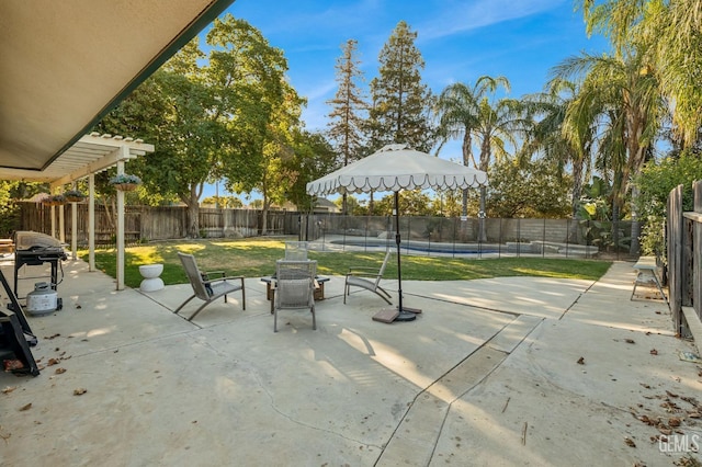 view of patio with a grill