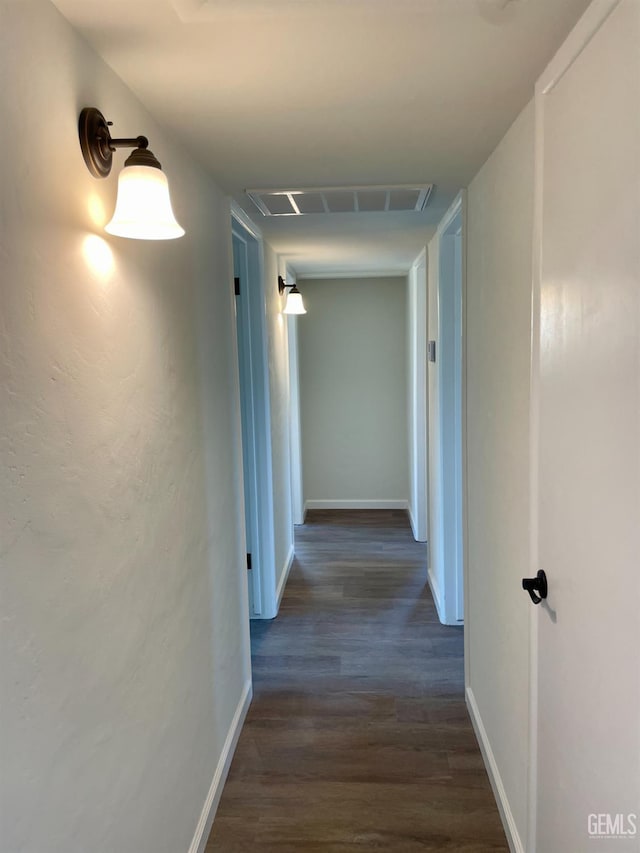 656 Minter Ave, Shafter, CA 93263 - hallway featuring dark wood-type flooring and attic access