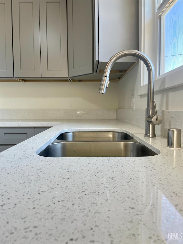 656 Minter Ave, Shafter, CA 93263 - kitchen view of gray cabinetry and light stone counters