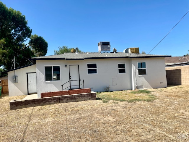 656 Minter Ave, Shafter, CA 93263 - rear view of house featuring stucco siding