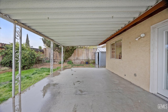 view of patio featuring fence