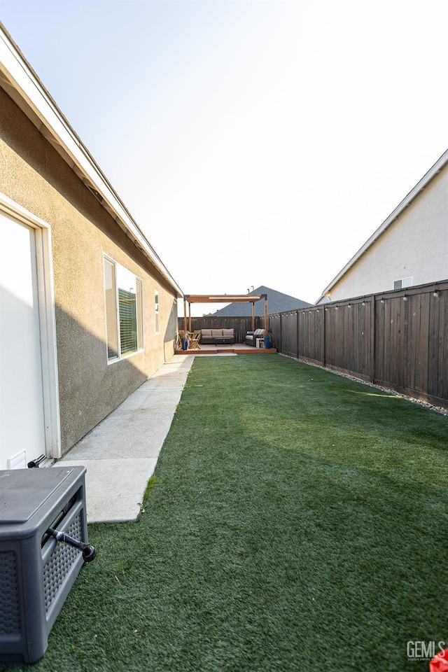 view of yard featuring a patio area and ac unit