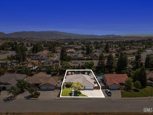 aerial view featuring a residential view and a mountain view